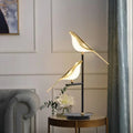 Lampe de chevet noire ornée d’oiseaux dorés